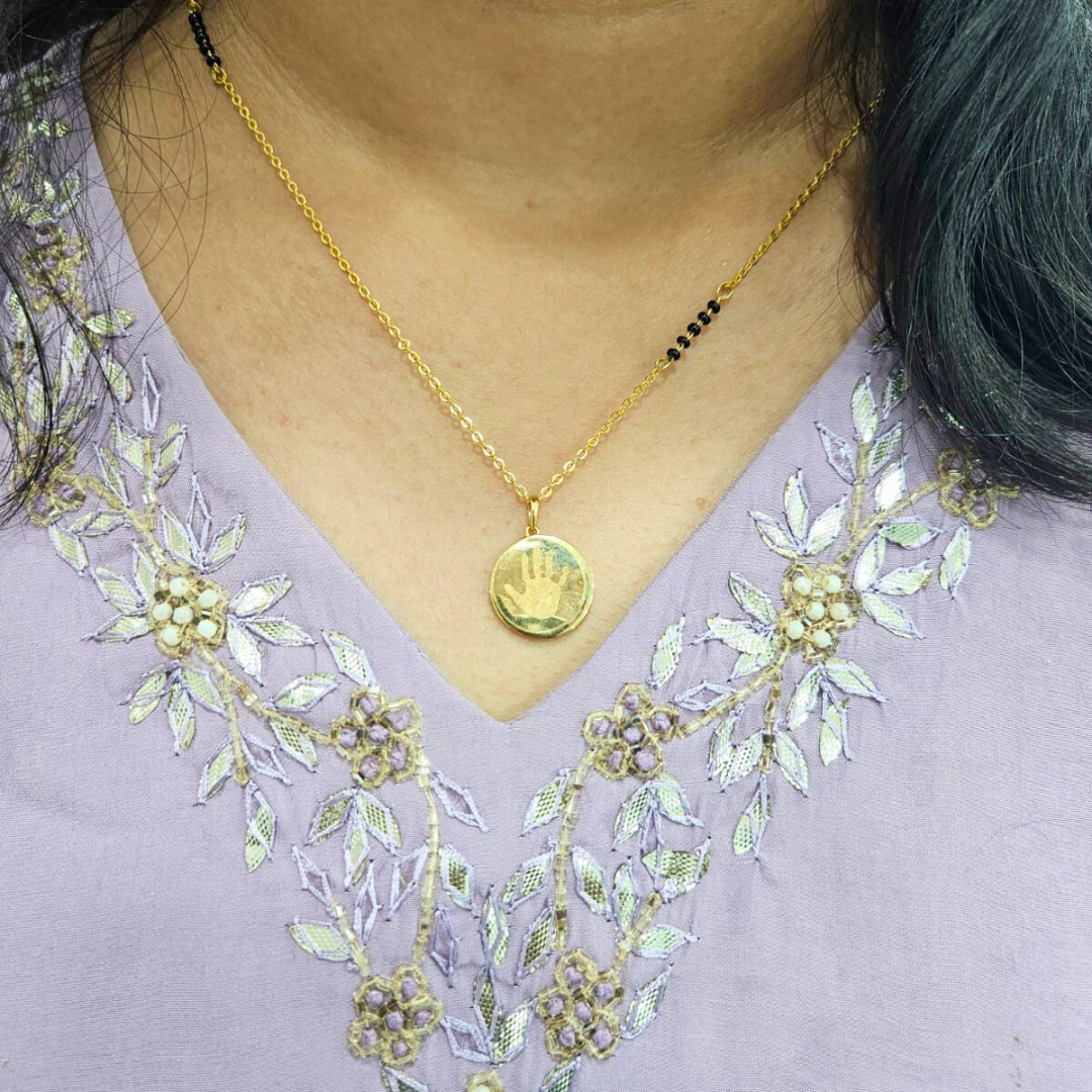 Gold Pendant with Baby Hand imprint and custom engraving by Vai Ra