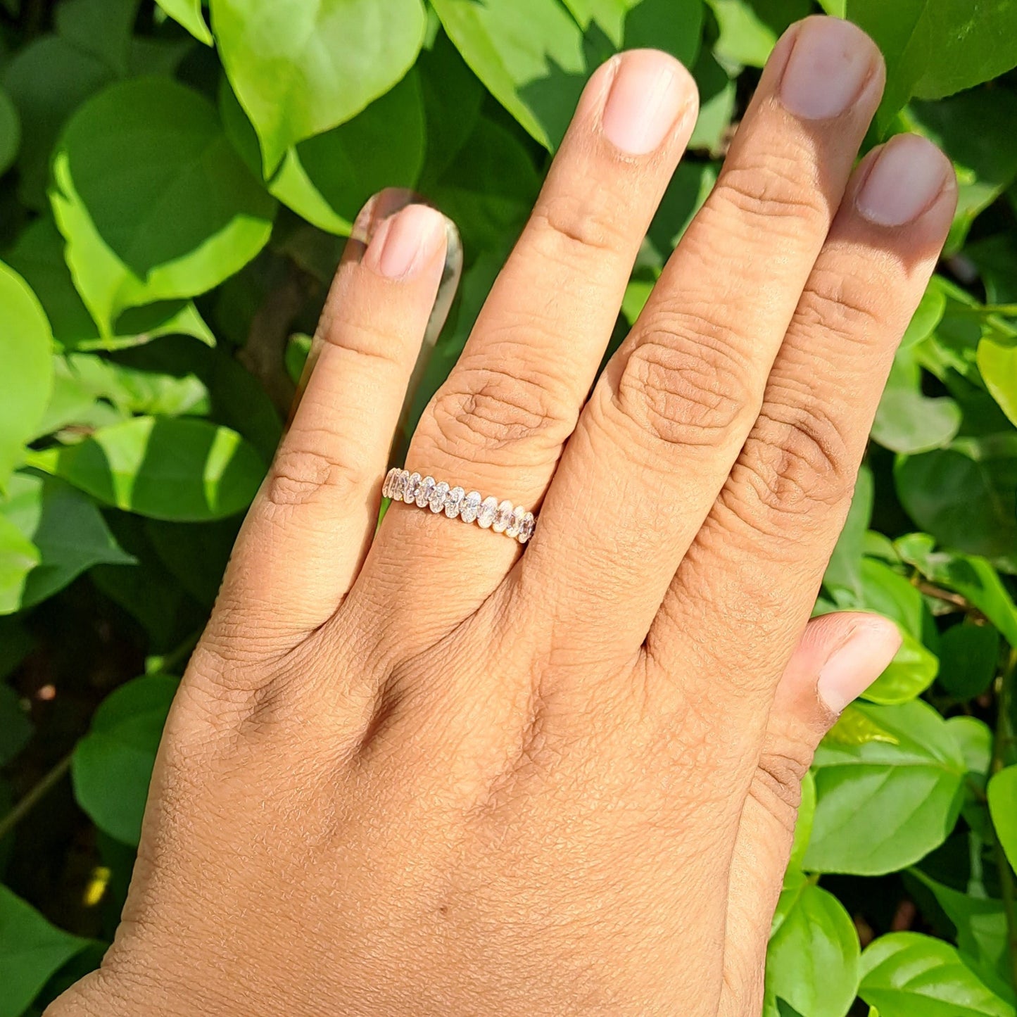 Sharvi Oval Half Eternity Band