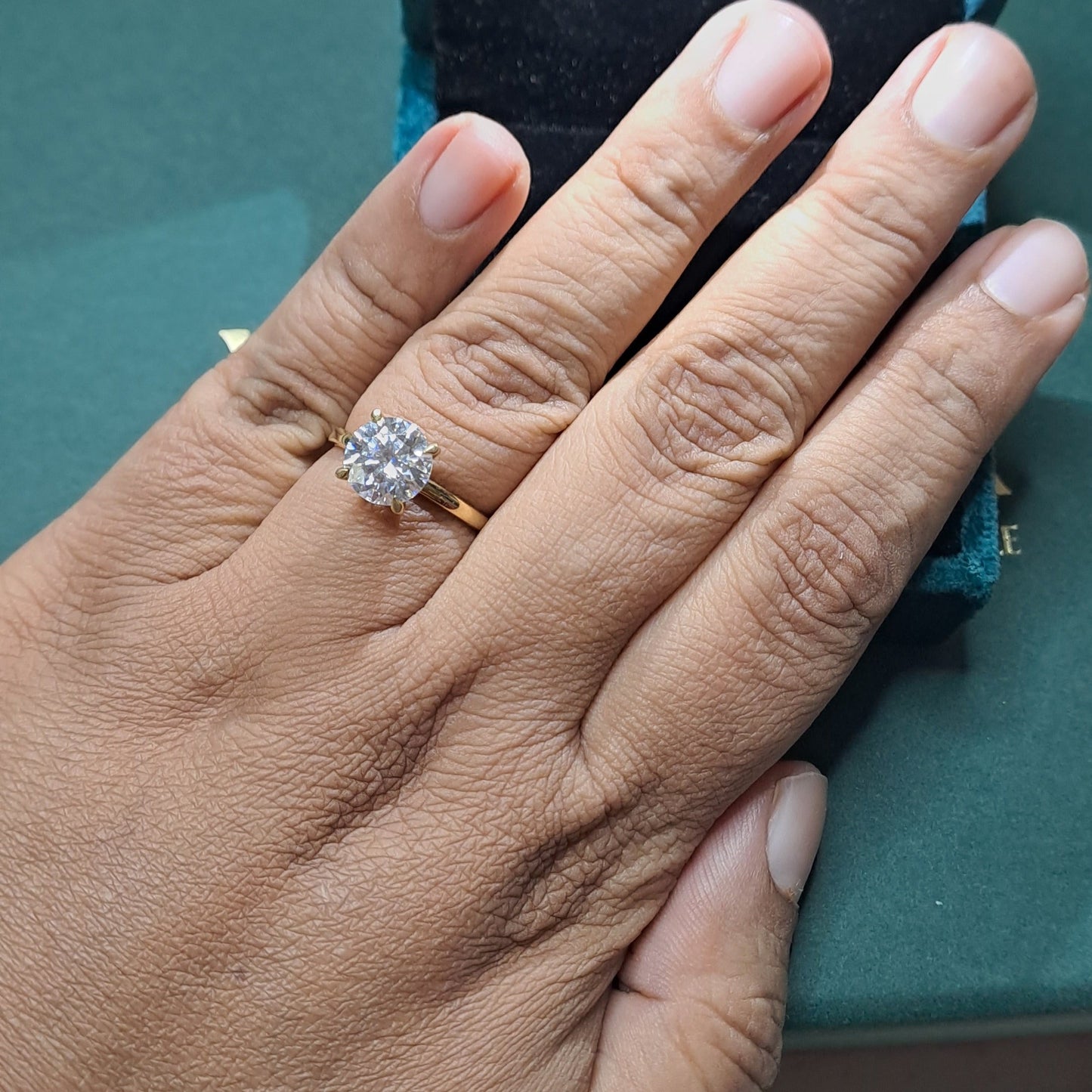 Priya Solitare Ring by Vaira in Moissanite and Gold