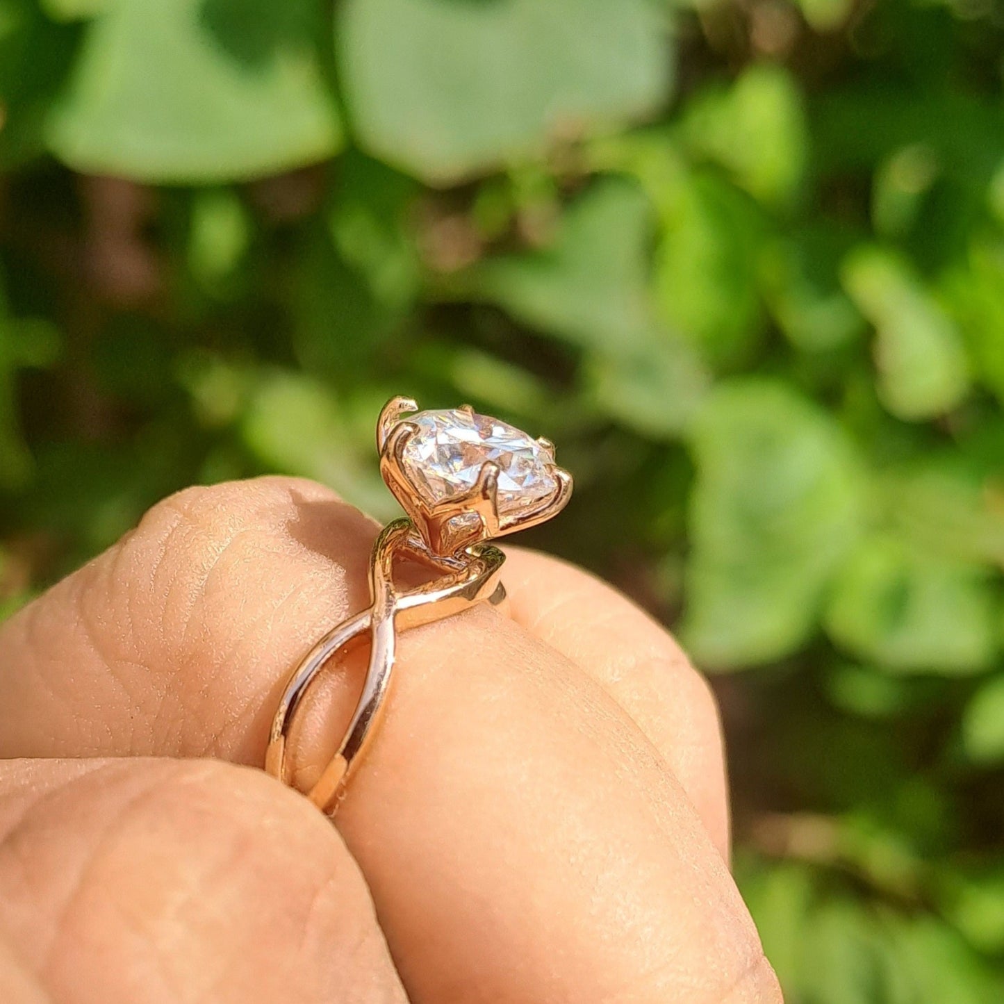 Step into a realm of enchantment with our Narnia Ring, where timeless elegance meets whimsical charm. At its heart lies a captivating solitaire, cradled delicately in tulip prongs, radiating brilliance and grace. The band, intricately designed with an infinity pattern, symbolizes eternal love and infinite possibilities.