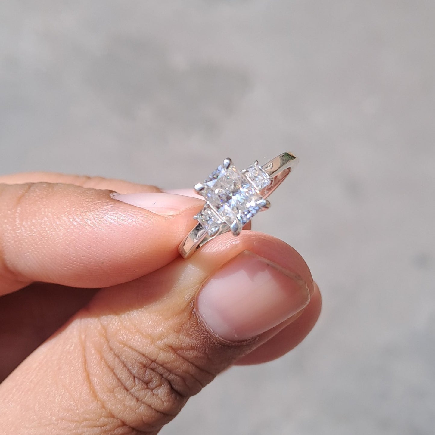 Emanate timeless elegance with our radiant 3-stone ring, a symbol of enduring love and commitment. Featuring three exquisite stones, each carefully selected for its brilliance and beauty, this ring captures the essence of sophistication and luxury.