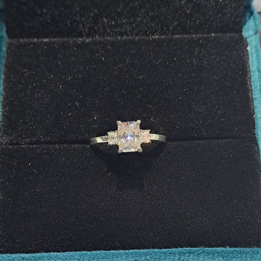 Emanate timeless elegance with our radiant 3-stone ring, a symbol of enduring love and commitment. Featuring three exquisite stones, each carefully selected for its brilliance and beauty, this ring captures the essence of sophistication and luxury.