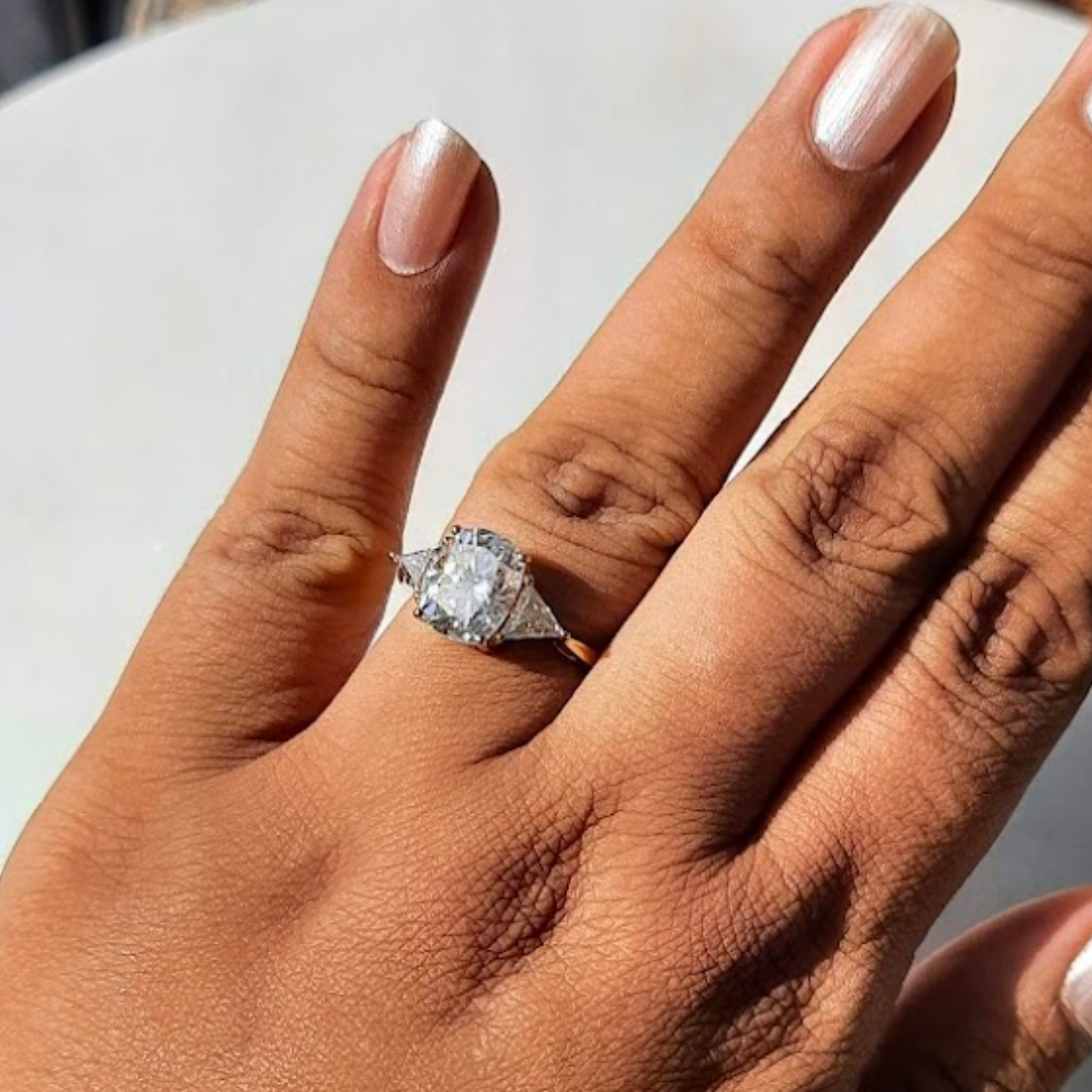 Moissanite diamond threestone engagement ring