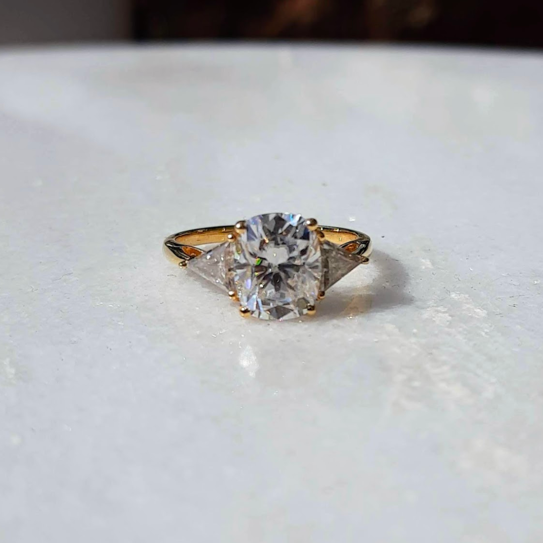 Moissanite diamond threestone engagement ring