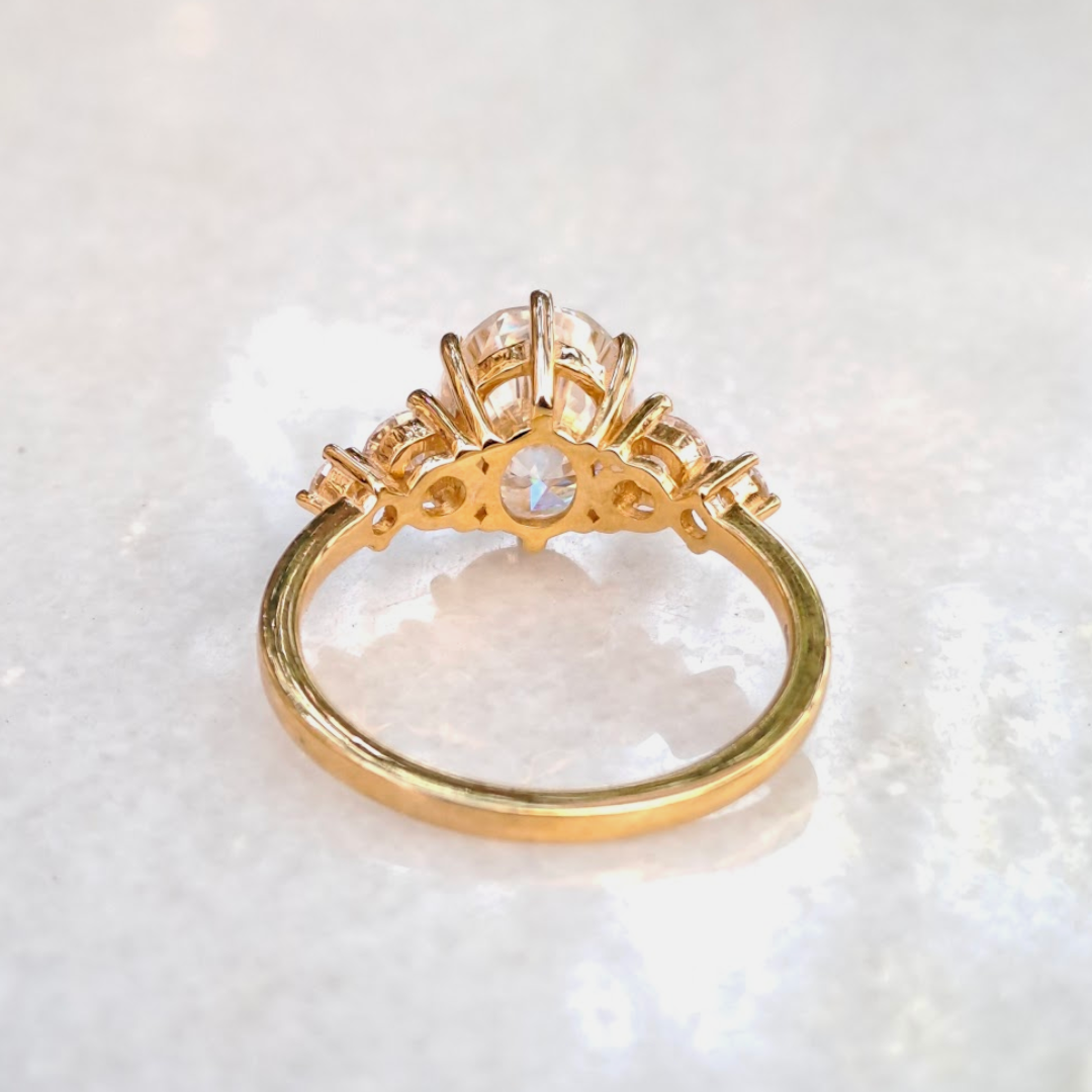 Moissanite diamond threestone engagement ring