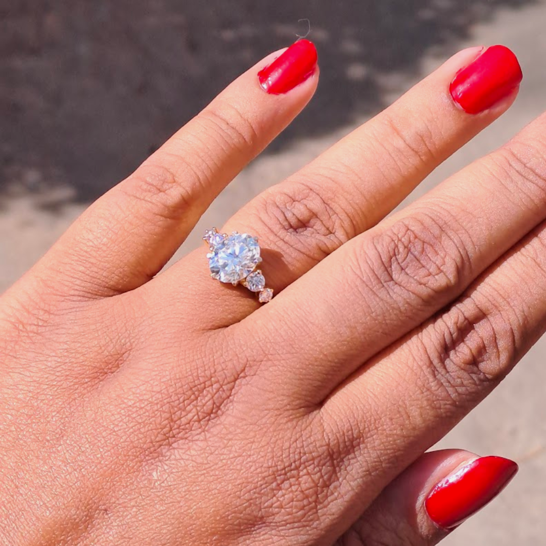Moissanite diamond threestone engagement ring