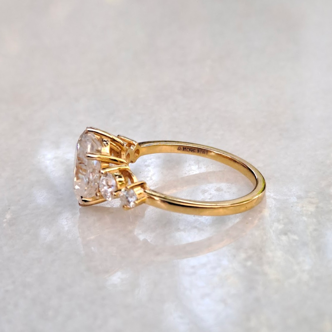 Moissanite diamond threestone engagement ring