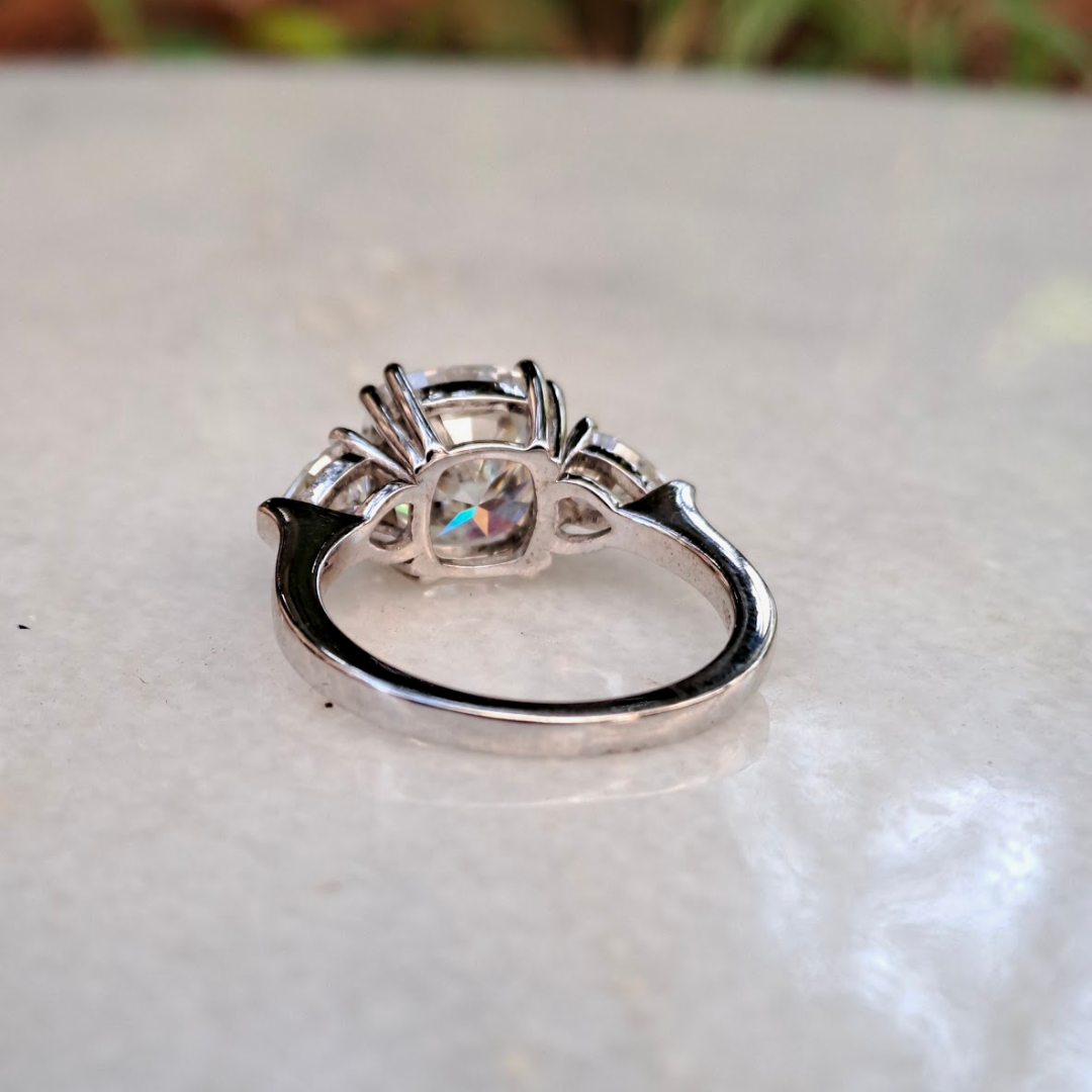 Moissanite diamond threestone engagement ring