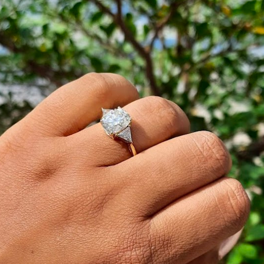 Moissanite diamond threestone engagement ring
