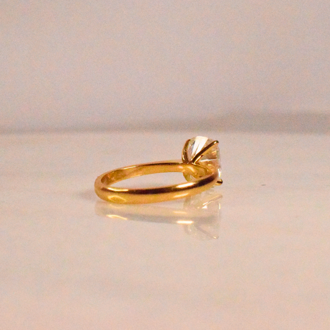 Elongated Cushion Moissanite Diamond in Gold and Silver