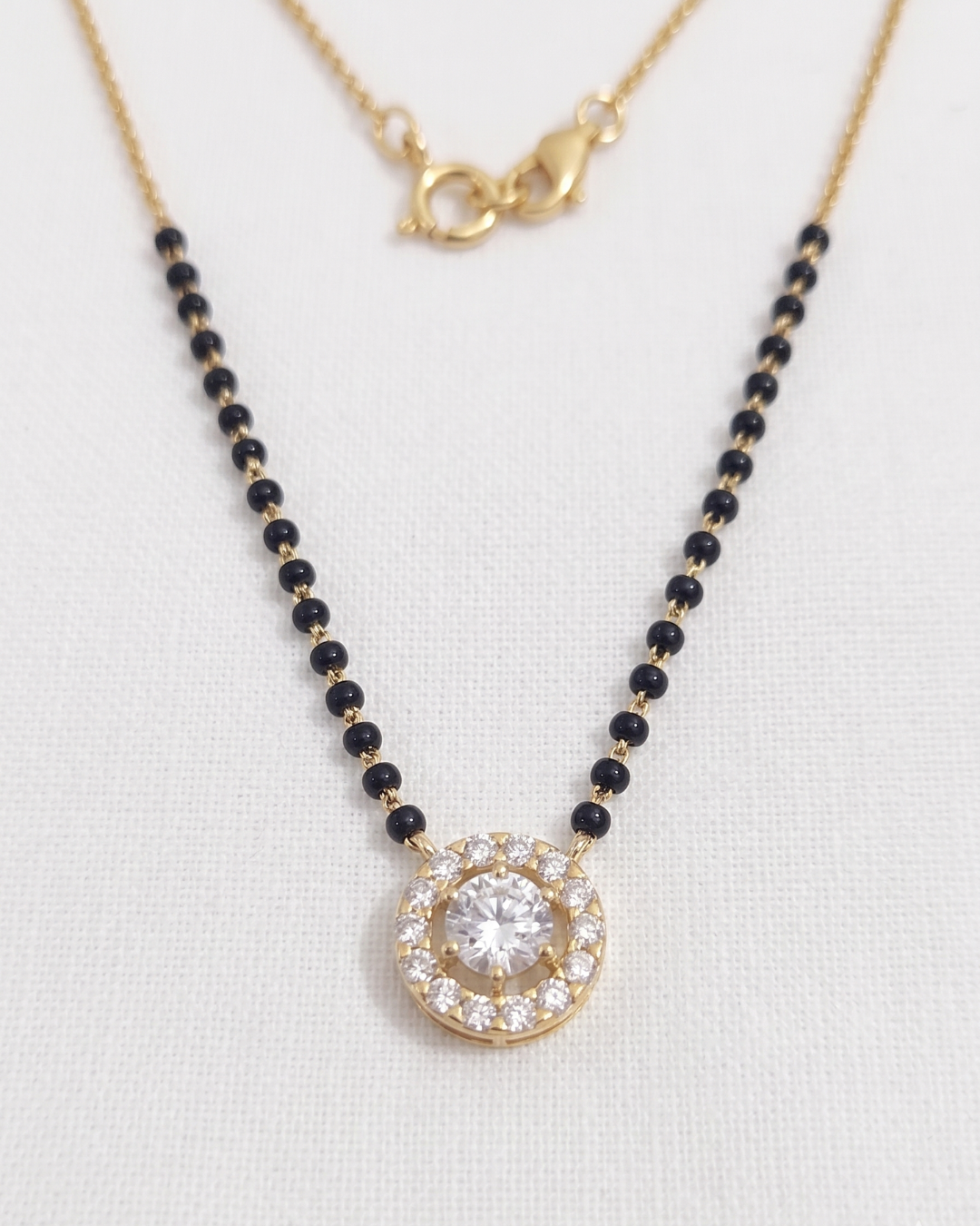 Trishna Halo Mangalsutra in Moissanite or Lab Diamond with black beads by Vai Ra
