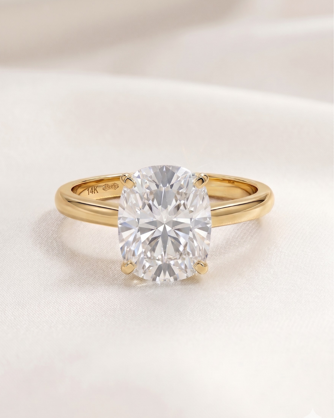 Elongated Cushion Moissanite Diamond in Gold and Silver