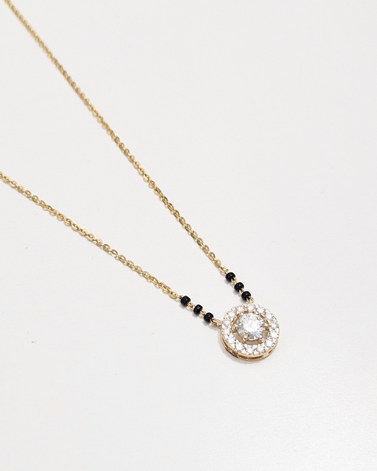 Valaya Halo Mangalsutra by Vai Ra in Gold with Moissanite and Lab Diamond