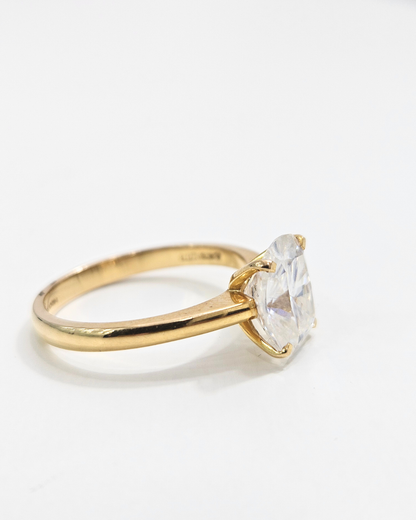 Elongated Cushion Moissanite Diamond in Gold and Silver
