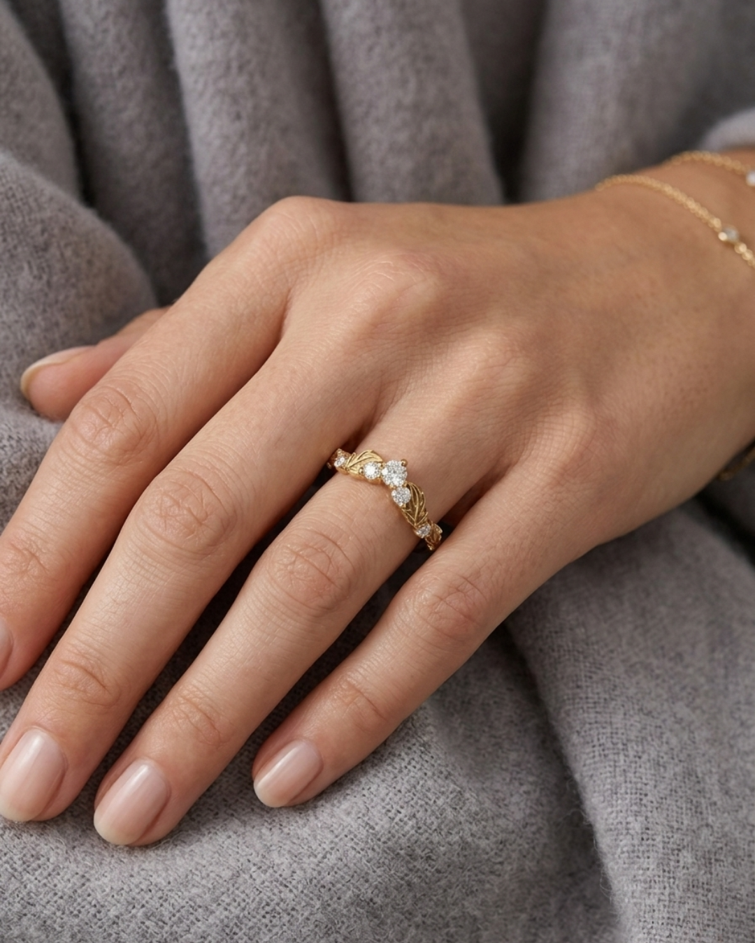 Valli Gold ring with leaf designs and 0.2 CT  small diamonds by Vai Ra
