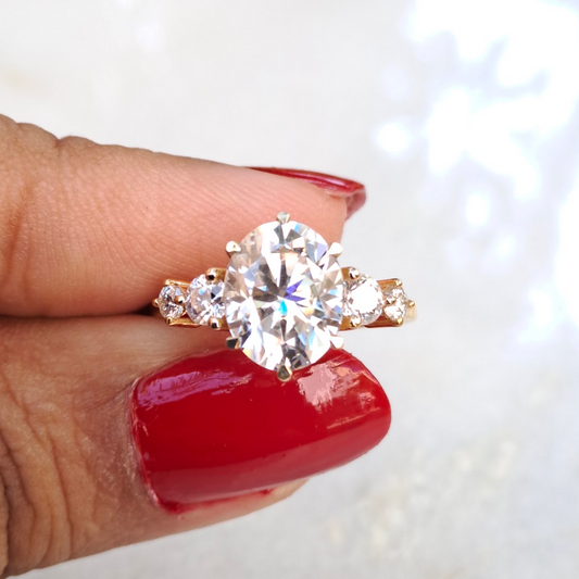 Moissanite diamond threestone engagement ring