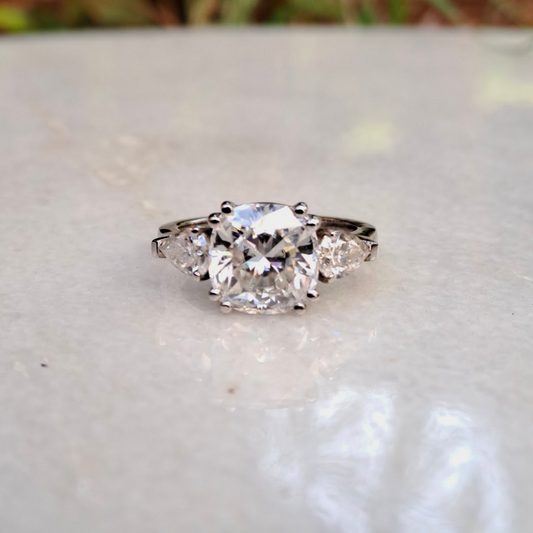 Moissanite diamond threestone engagement ring