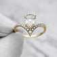 Pear Moissanite Ring in Silver and Gold