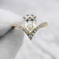 Pear Moissanite Ring in Silver and Gold