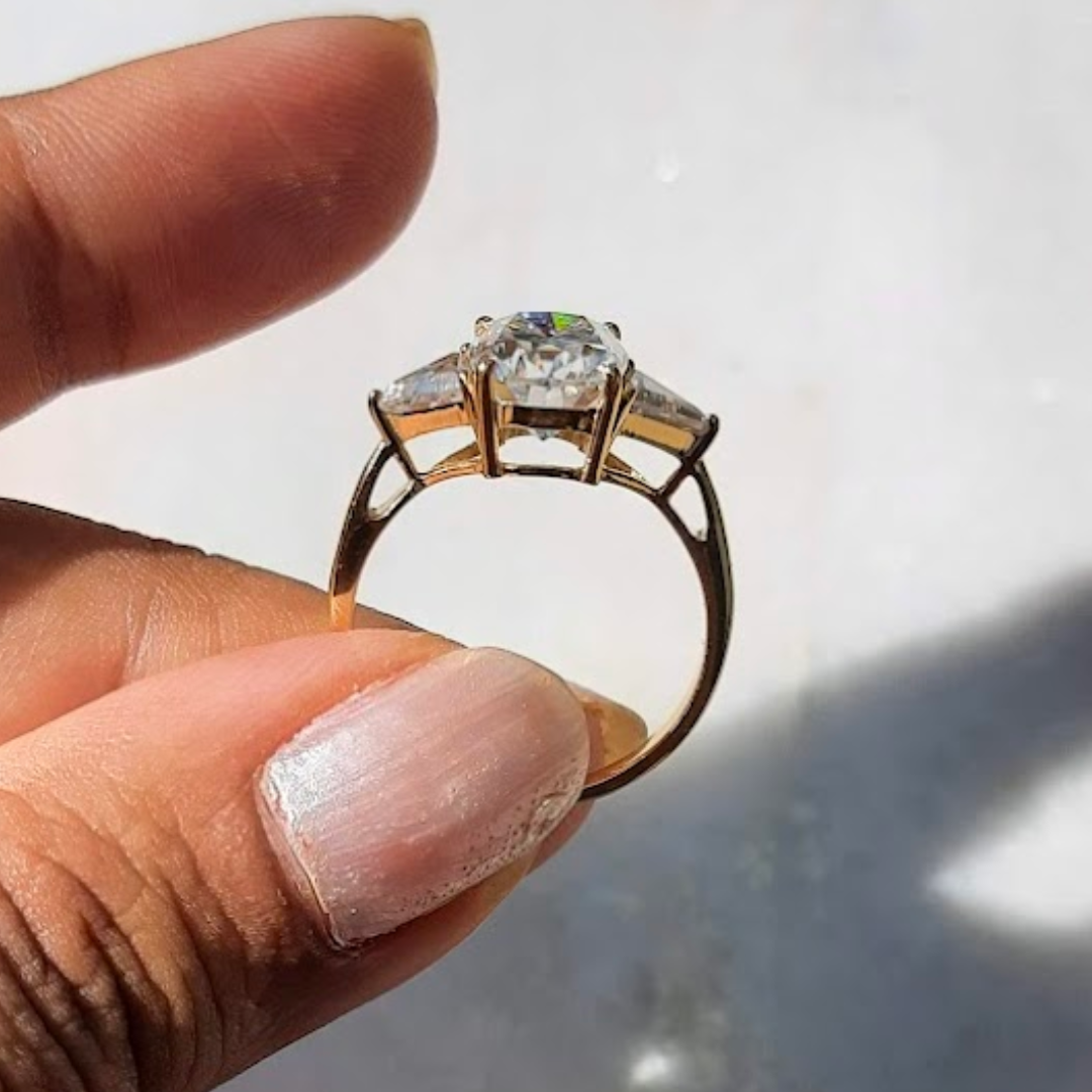 Moissanite diamond threestone engagement ring