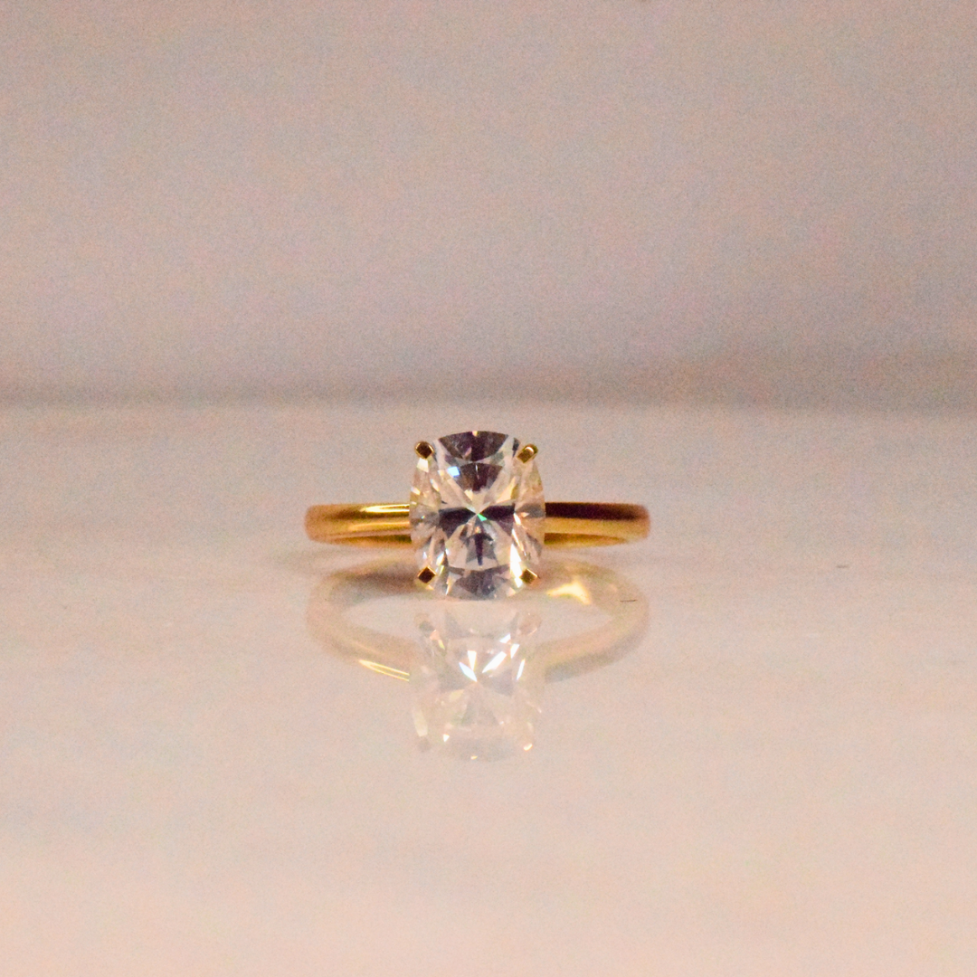 Elongated Cushion Moissanite Diamond in Gold and Silver