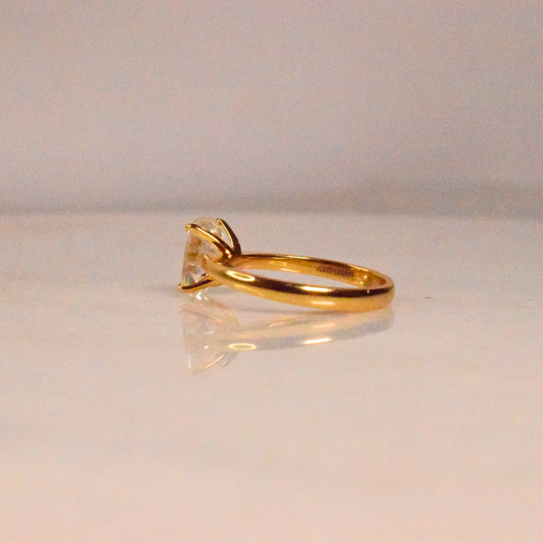Elongated Cushion Moissanite Diamond in Gold and Silver