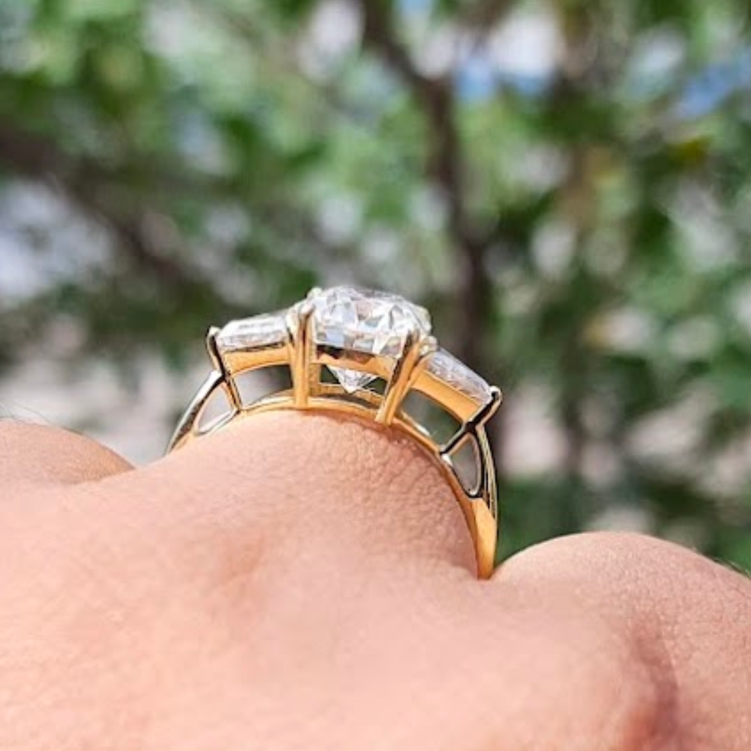 Moissanite diamond threestone engagement ring