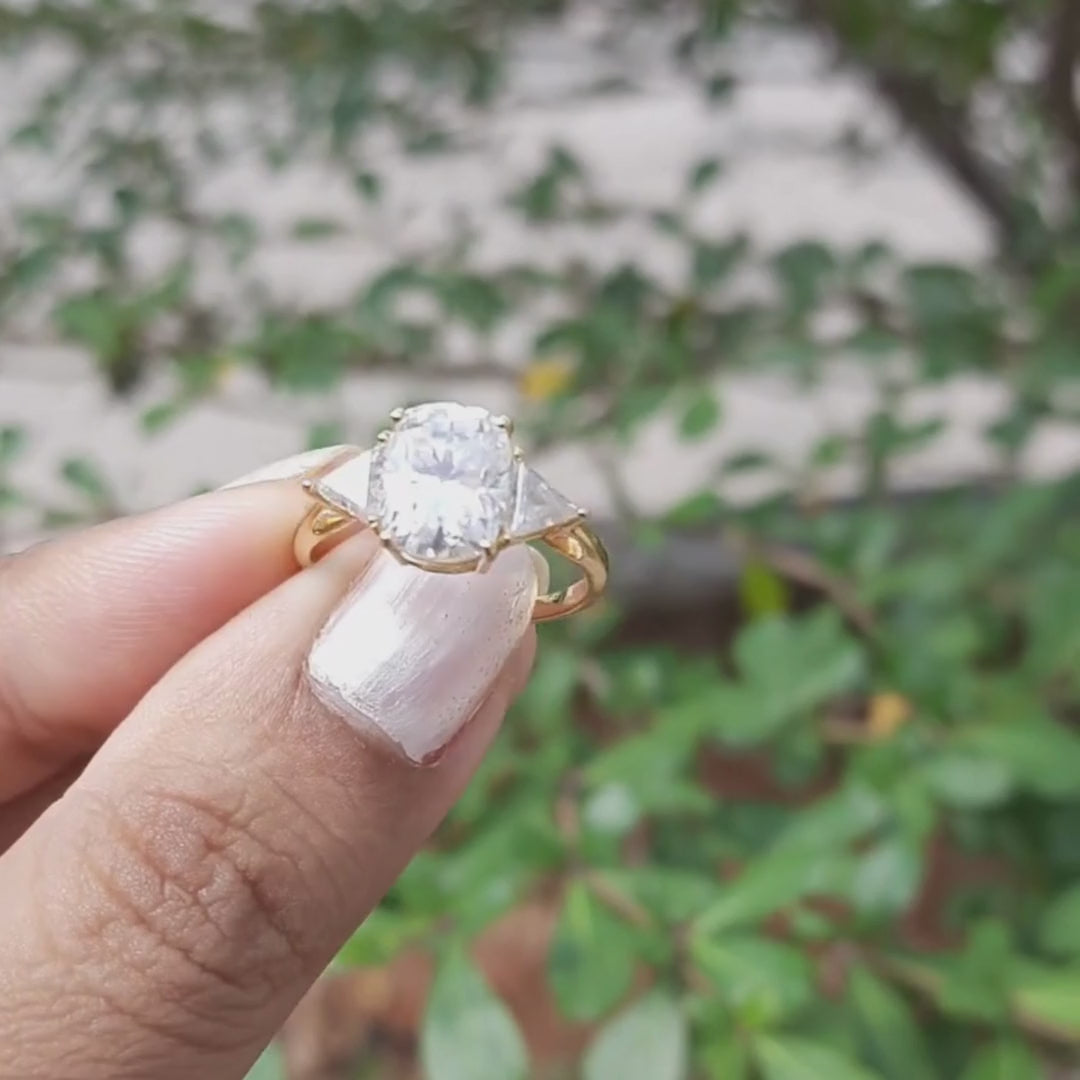 Moissanite diamond threestone engagement ring